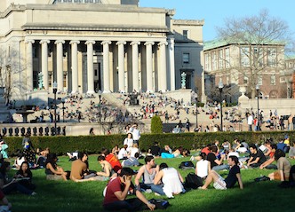 Columbia University students relaxing on campus.