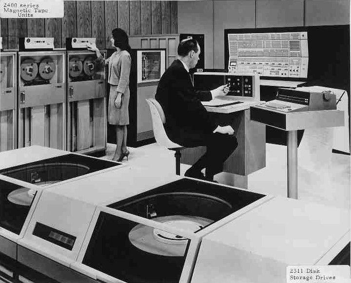  Foreground: IBM 2311 Disk Storage Drives, providing random direct access to 