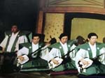 A lineup of samisen players and narrators perform for a special scene on the yuka