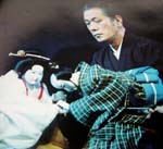Tokubei with Ohatsu in the final scene of Chikamatsu's Love Suicides at Sonezaki