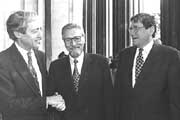 Constantinescu (center) with President Rupp and U.S. Ambassador to the U.N. Richard Holbrooke.