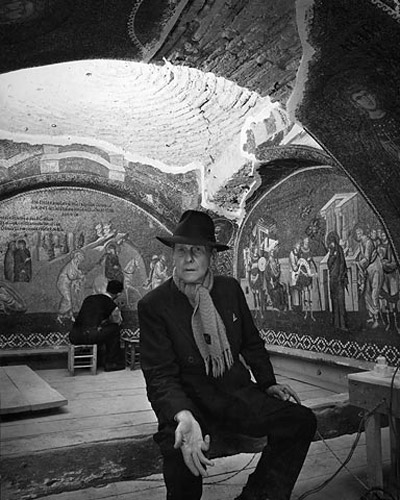 Thomas Whittemore seated on scaffolding in the outer narthex of the Kariye Camii, 1945–50
