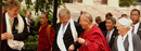 The Dalai Lama speaks with Columbia President Lee Bollinger during his visit to the World Leaders Forum.