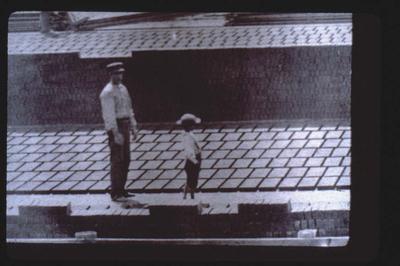 Brick Yard with Man and Boy