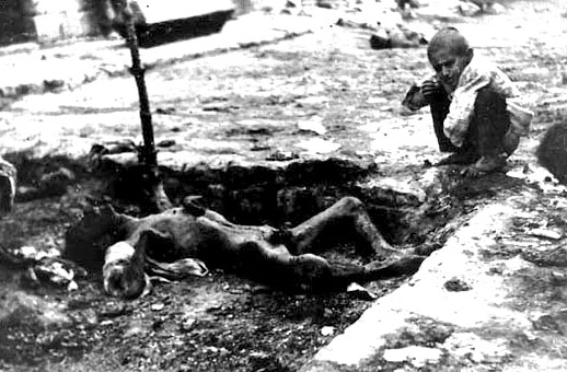 Murdered Armenian Male Adult Lying in a Ditch as Children Watch the Corpse