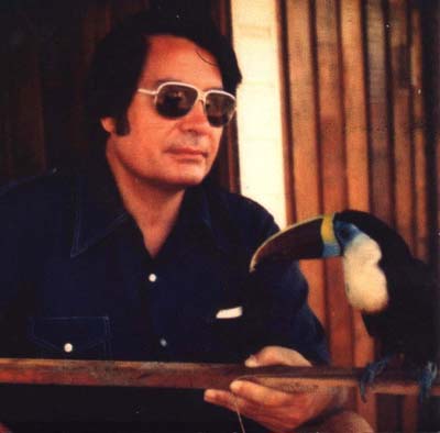 Jonestown Jim Jones. Jim Jones with exotic bird at