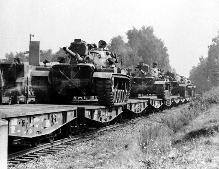 M60 tanks on train