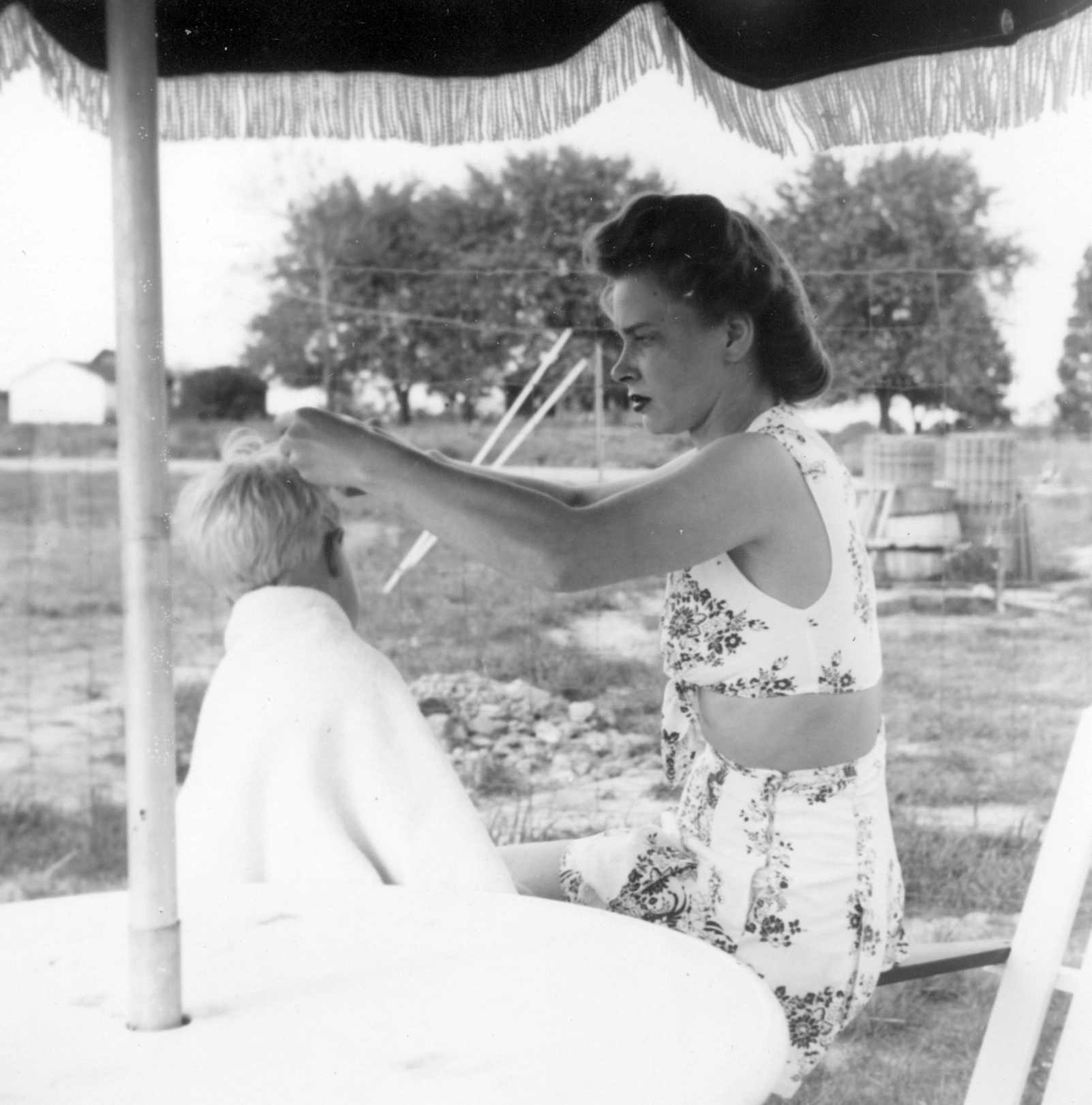 Mom giving me a haircut