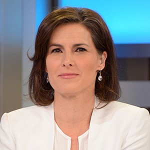 Claire Shipman, a woman with medium-length dark hair. 