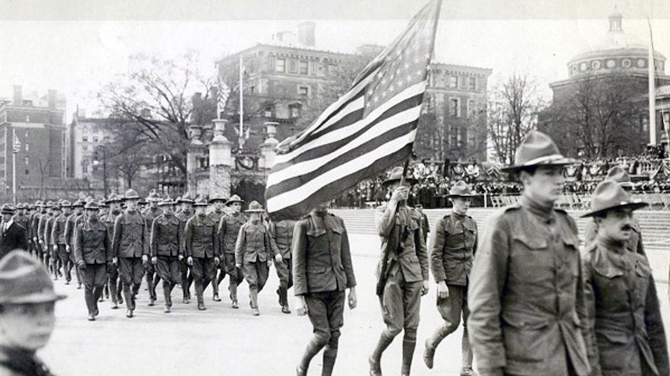 A formation of soldiers marching on Columbia's campus during World War I.