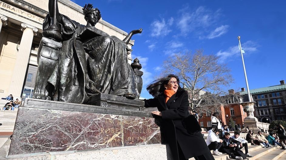 Nemat Minouche Shafik, Columbia University's 20th president, poses in front of Alma Mater on Low Library Plaza.