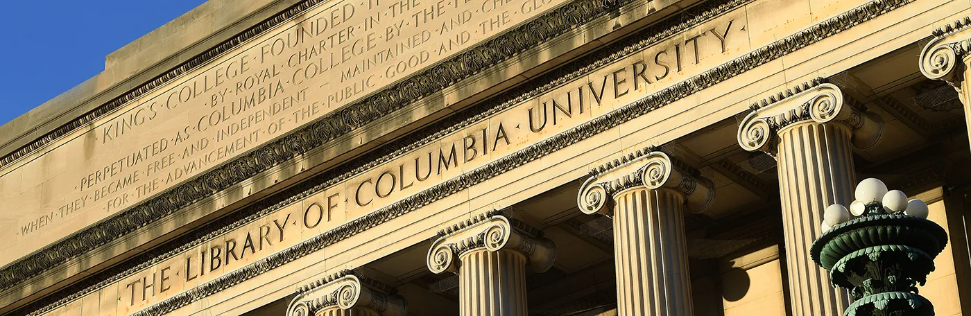 Low Library's facade: classical columns below the words "The Library of Columbia University."