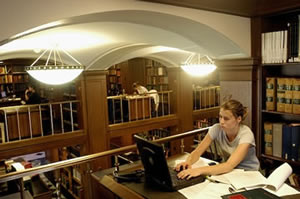 student studying in library